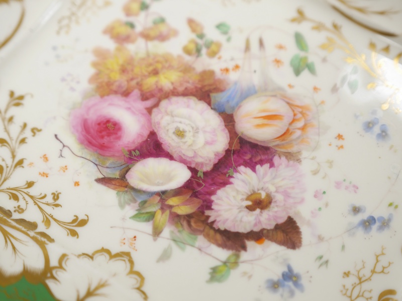 A mid 19th century English porcelain basket and a similar dish, 32cm. Condition - area of restoration to basket